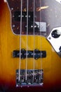 Close up of solid electric bass guitar in sunburst Royalty Free Stock Photo