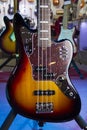 Close up of solid electric bass guitar in sunburst Royalty Free Stock Photo