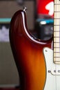 Close up of a solid sunburst from black to brown electric guitar Royalty Free Stock Photo