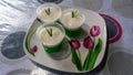 Close up of Som Som Sagu or Sagu Gula Aanau with pandan leaf on a flower plate on table