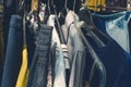 Some clothes on a wardrobe rail found on a flea market