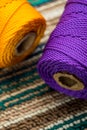 Close up of some different colorful rolls of thread