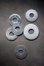 Round metal steel washers on a table Royalty Free Stock Photo