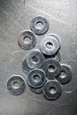 Round metal steel washers on a table Royalty Free Stock Photo