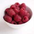 Close up of some raspberries in a bowl. Conceptual image Royalty Free Stock Photo