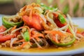 Close up Somtum. Thai spicy green papaya salad.