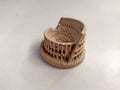 Close-up on a souvenir Colosseum from Rome on a white background