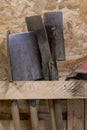 Close-up of spades, garden tools, stored in a wooden shed