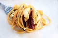 Spaghetti with dried chili, garlic and crab in white dish. Royalty Free Stock Photo