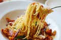 Close up spaghetti with mushroom, bacon, garlic , cheese and dried chilli with fork Royalty Free Stock Photo