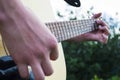 Close-up Of A Spanish Guitar. Spanish Classical Guitar Exterior. Music And Nature Royalty Free Stock Photo