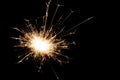 Sparkler lit in the dark Royalty Free Stock Photo