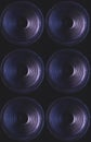 Close-up of speakers membrane on black background with colored lighting. Royalty Free Stock Photo