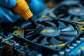 Close-up of specialist hands cleaning pc cooler Royalty Free Stock Photo