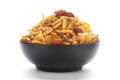 Close-Up of Spicy Chatpata Mixture in a black Ceramic bowl made with peanuts, corn flakes. Indian spicy snacks Namkeen Royalty Free Stock Photo