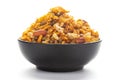 Close up of spicy Ratlami mixture Indian namkeen snacks on a ceramic black bowl. Royalty Free Stock Photo