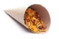 Close up of spicy Ratlami mixture Indian namkeen snacks In handmade handcraft brown paper cone bag