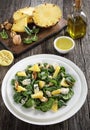Close-up of spinach cheese pineapple walnut salad Royalty Free Stock Photo
