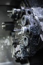 Close up spindle chuck and product part set on high precision Cnc industrial lathe turning machine Royalty Free Stock Photo