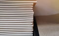 Close up spine books, brown and white background, Book stack on bookshelf in the library room