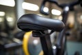 close up of spinning bike saddle in an indoor gym