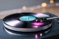 Close-up of a spinning vinyl record on a turntable with soft bokeh lights in the background Royalty Free Stock Photo