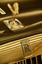 Close up of the Spirit of Ecstasy and Rolls Royce Logo on the shining grill on the front of a RR Phantom car. Hong Kong, China - Royalty Free Stock Photo