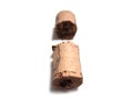 Close up of split wine bottle cork. Pieces of bottle cap on white background. Corks isolated on white background. Old cork stopper Royalty Free Stock Photo