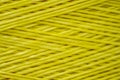 Close up of a Spool of Synthetic Green Thread