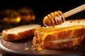 close-up of a spoonful of honey dripping onto bread