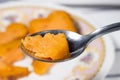 Close-up of spoonful of roasted sweet potato