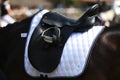 Close up of a sport horse saddle. Quality classical leather saddle Royalty Free Stock Photo