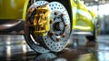 Close-up of sports car brake system with focus on large ventilated disc brake and caliper with brake pads. Concept Royalty Free Stock Photo