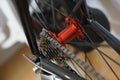 Racing bicycle red rear axle with racing cassette gears