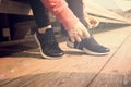 Female hands tying shoelace on running shoes before practice. Runner getting ready for training. Sport active lifestyle Royalty Free Stock Photo