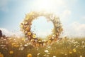 Close-up of spring summer flower wreath on a green meadow. Pagan tradition and holiday of Midsummer solstice