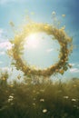 Close-up of spring summer flower wreath on a green meadow. Pagan tradition and holiday of Midsummer solstice