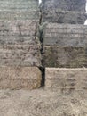 A close-up of Square hay bales stacked on top of each other Royalty Free Stock Photo