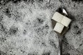 Close-up of a square white sugar cube on a spoon. Royalty Free Stock Photo