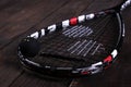 Close up of a squash racket and ball on the wooden background Royalty Free Stock Photo