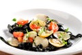 Close-up of squid ink colored tagliatelle