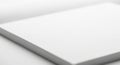 A close-up of a stack of blank white paper with a smooth texture. The focus is on the corner and Royalty Free Stock Photo
