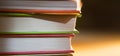 Close-up of a stack of books. The concept of home reading of paper books, school education and Institute, back to school. Royalty Free Stock Photo