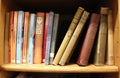 Close-up of a stack of books on a shelf
