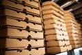 Close-up of a stack of brown pizza delivery boxes Royalty Free Stock Photo