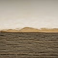 Close-up of a stack of brown, textured card stock or heavyweight paper sheets. The Royalty Free Stock Photo