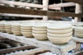 Close up clay pottery ceramic products dry on shelf Royalty Free Stock Photo