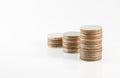 Close up stack of coins on white background for financial and sa Royalty Free Stock Photo