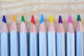 Close up Stack Colour Pencils on Wooden Background Royalty Free Stock Photo