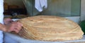 a stack of arabic bread called Markook in lebanon, juste after being cooked on a convex iron plate. Royalty Free Stock Photo